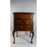 A Small Mahogany Bow Fronted Three Drawer Chest on Cabriole Legs, 45cm Wide and 77cm Tall