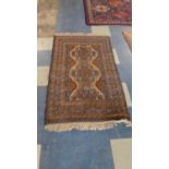 A Vintage Pattern Woollen Rug on Blue Ground 150x84cm