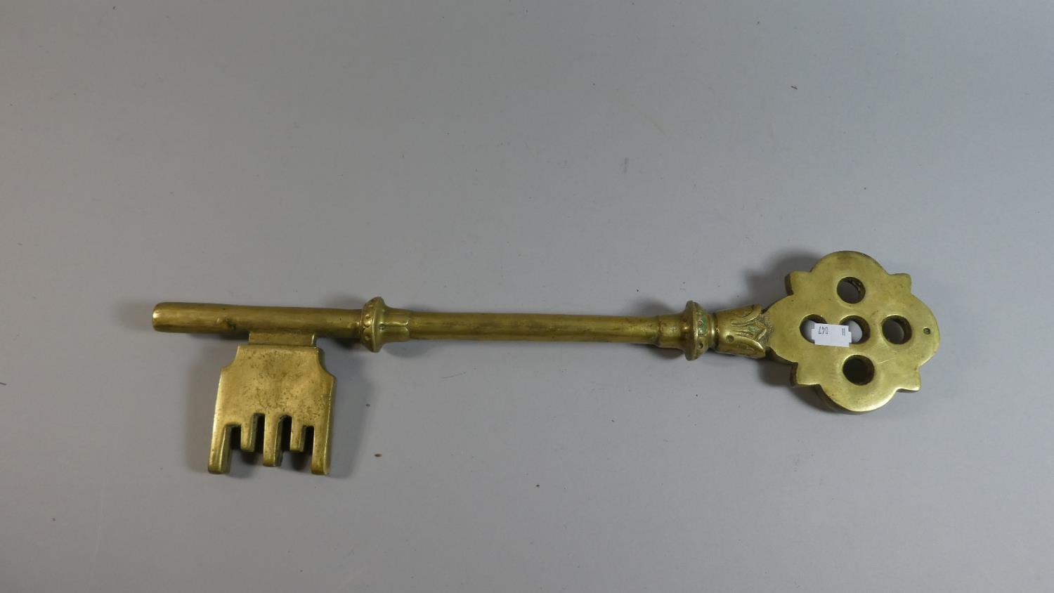 A Large Heavy Ornamental Brass Key, 50cm Long