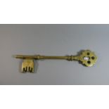 A Large Heavy Ornamental Brass Key, 50cm Long