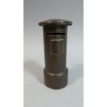 A 19th Century Brass Novelty Money Bank in the Form of a Post Box, 12cm High