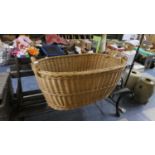 A Large Oval Wicker Basket, 89cm Wide