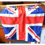 A Cloth Union Jack with Two Piece Flag Pole and Leather Carrying Strap