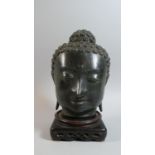 A Patinated Cast Study of Buddha in the Ayutthaya Period Style Set on Wooden Stand, 29cm High