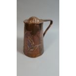 An Art Nouveau Copper Lidded Jug with Floral Decoration in Relief, by JS&S , 17cm High