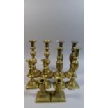 A Collection of Five Pairs of Victorian Brass Candle Sticks, the Largest 30cm High