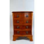 A Miniature Mahogany Reproduction Serpentine Fronted Chest of Four Long Drawers, 41cm Wide