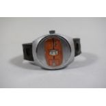 A Vintage Ruhla Manual Wind East German Jump Hour Wrist Watch with Orange Face, Made in GDR