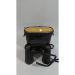 A Pair of 10x50 Boots Cased Binoculars
