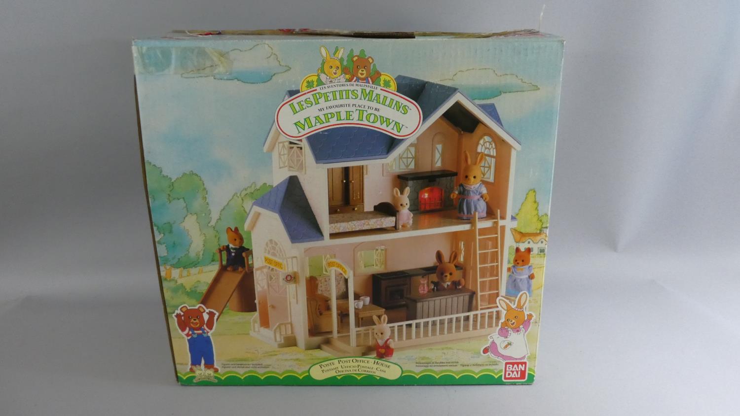 A Boxed Playworn Les Petit Malins Post Office House with Furniture and Figures
