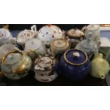 A Tray of Various Decorated Teapots and a Storage Jar