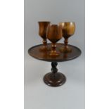 An Oak Circular Topped Tazza on Barley Twist Support, 26cm Diameter Together with Three Wooden