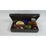 A Chinoiserie Box Containing a Number of Curios to include Cigarette Case, Cloisonné Egg, Bulldog