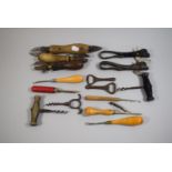 A Small Collection of Corkscrews, Vintage Cutters, Bottle Openers etc