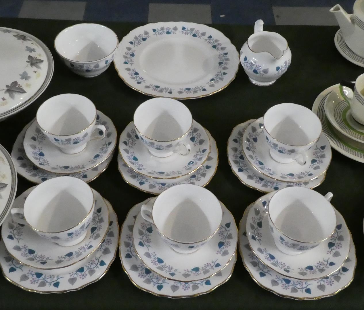 A Royal Vale Tea Set Comprising Six Trios Cake Plate, Sugar and Cream