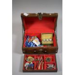 A Jewellery Box in the Form of a Treasure Chest Containing Enamelled Badges, Brooches, Greyhound