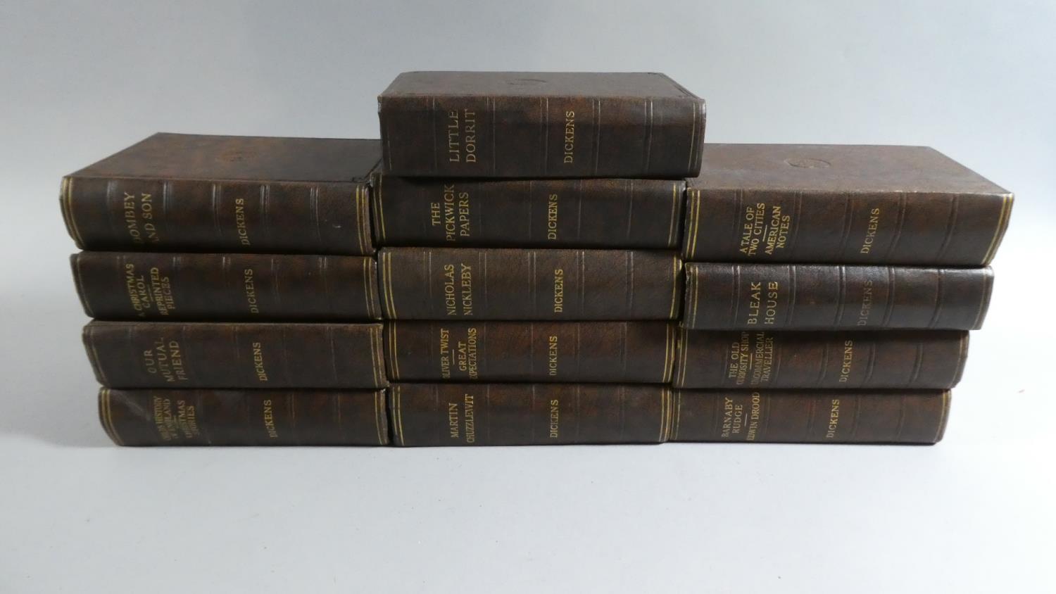 A Collection of Thirteen Bound Dickens Volumes