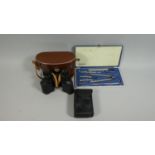 A Leather Cased Pair of Binoculars, Small Pair of Binoculars and a Drawing Set