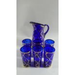A Bohemian Glass Cobalt Blue Lemonade Set Comprising Jug and Six Tumblers
