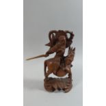 A Carved Oriental Wooden Study of Mounted Warrior, 24cm High