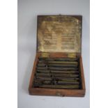 A Cased Set of 19th Century Combination Brass Rules Patterns for Tooling Leather Etc