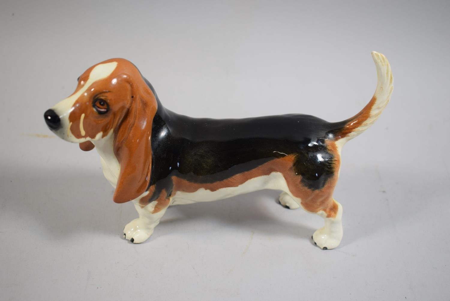 A Collection of Three Dog Ornaments to Include Beswick Basset Hound, Sylvac Terrier and Capstone - Image 3 of 4