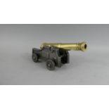 A Steel and Brass Model of a 1769 Cannon, 19cm Long