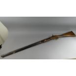 A 19th Century Percussion Cap Sporting Smooth Bore Rifle by C.W James