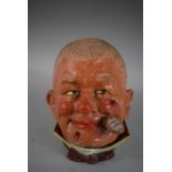 A Continental Novelty Terracotta Spill Vase in the form of Gents Head Smoking Cigar, 14cm High