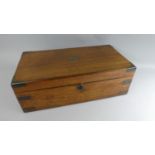 A 19th Century Mahogany Campaign Writing Slope with Inset Brass Carrying Handles and Secret