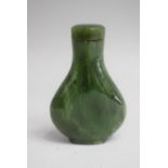 A Chinese Spinach Green Jade Snuff Bottle of Flattened Pear Shape Complete with Stopper. 6cms High