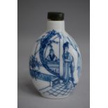 A Chinese Porcelain Snuff Bottle of Rectangular Form with Sloping Shoulders set on Raised Foot