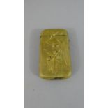 A Pretty Oriental Gilt Metal Vesta Case. Decorated in relief with Woman and Child Taking Shelter