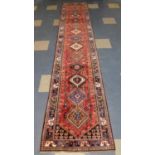 A Fine Persian Yalameh Runner, 381cm x 75cm