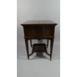 An Edwardian Mahogany Surprise Table with Rise and Fall Mechanism to Fitted Interior with Three