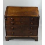 A Georgian Mahogany Fall Front Bureau with Fitted Interior, Four Long Drawers and Bracket Feet. 99.