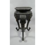 An Anglo Indian Vase Stand of Tripod Form. The Supports in the Form of Three Elephant Heads.