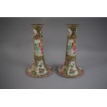 A Pair of Cantonese Candlesticks decorated in Usual Colour Enamels depicting Figures Birds and