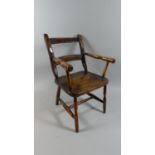 A 19th Century Primitive Country Made Childs Arm Chair. 33x45cms High