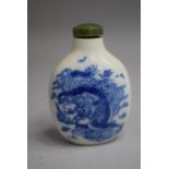 A Chinese Blue and White Glazed Snuff Bottle of Bulbous Pear Shaped Form decorated with Dragon