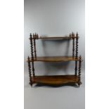 A Set of Early 19th Century William IV Rosewood Hanging Wall Shelves with Three Serpentine Fronted