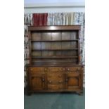 A 19th Century Inlaid Oak Dresser. The Base with Four Centre Drawers flanked by Drawer Over Cupboard