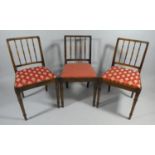 A Set of Eight Spindle Back Dining Chairs by Gomme