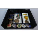 A Collection of Enamelled Pendants, Medals Etc