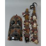 A Collection of Ethnic Items to Include Scabbards, Mask Etc