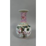 A Chinese Famille Rose Baluster Vase with Elongated Neck Decorated with Usual Enamels Tapering to