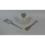 A Silver Topped Scent Bottle, H.M Birmingham 1901 by M Bros Together with a Silver Handled Shoe Horn