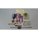 A Collection of Various WWI and WWII Military Medals, Dog Tag, Ribbons etc