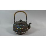 A Enamelled Teapot with Applied Line Work and Coloured Enamelled Decoration, 10cm high