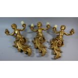 A Set of Three Gilded Plaster Figural Two Branch Wall Lights in the Form of Maidens, 45cm High